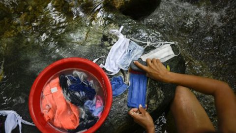 Venezuelan citizens draw water from any source available amid COVID crisis